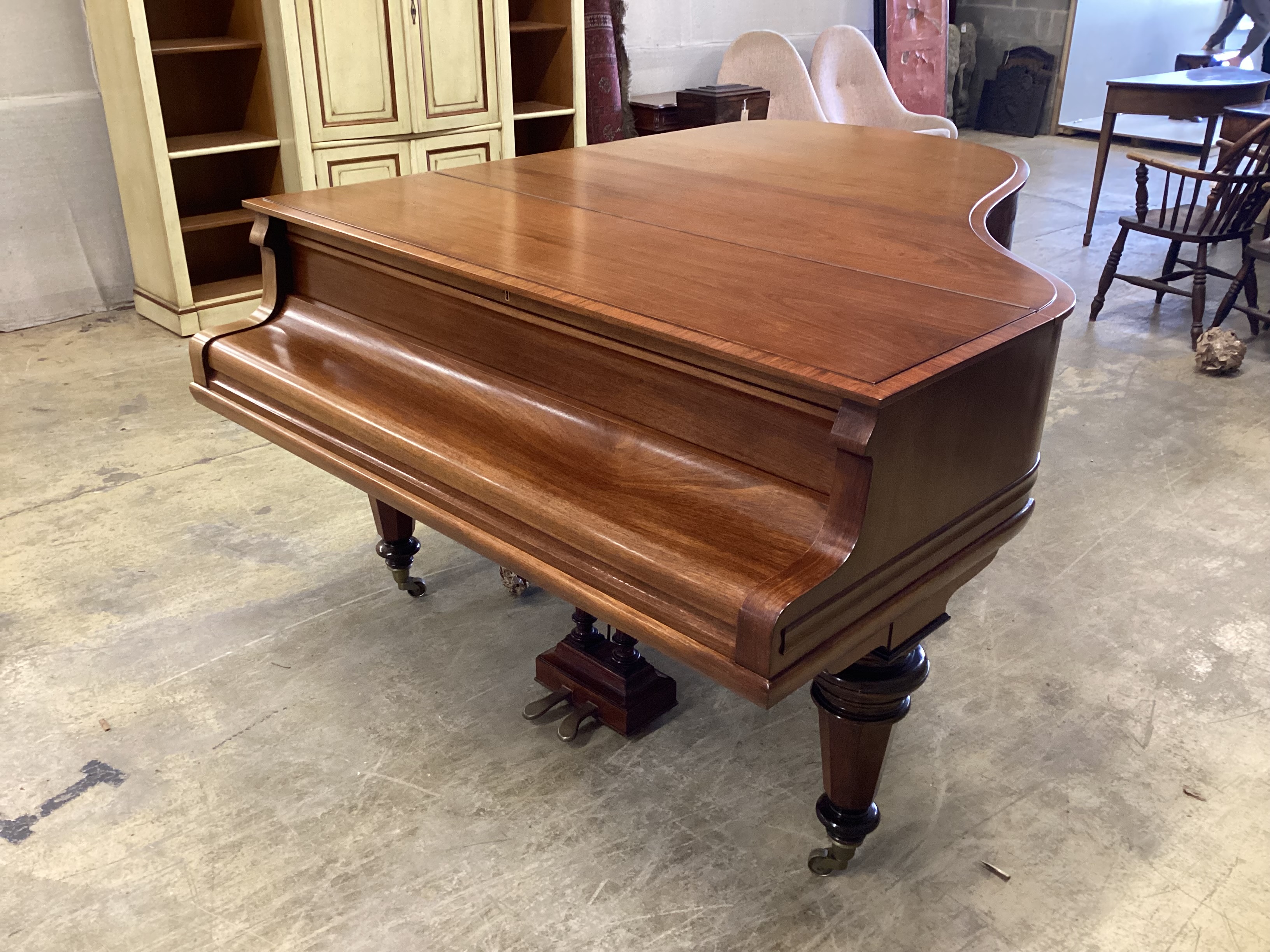 A Schiedmayer rosewood grand piano, circa 1935, length 194cm, width 152cm, height 99cm closed, together with a modern hinged box seat piano stool CITES Submission reference 2JRHUCGB